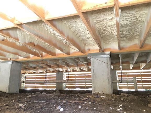 Photo of under a home with closed cell spray foam insulation 2